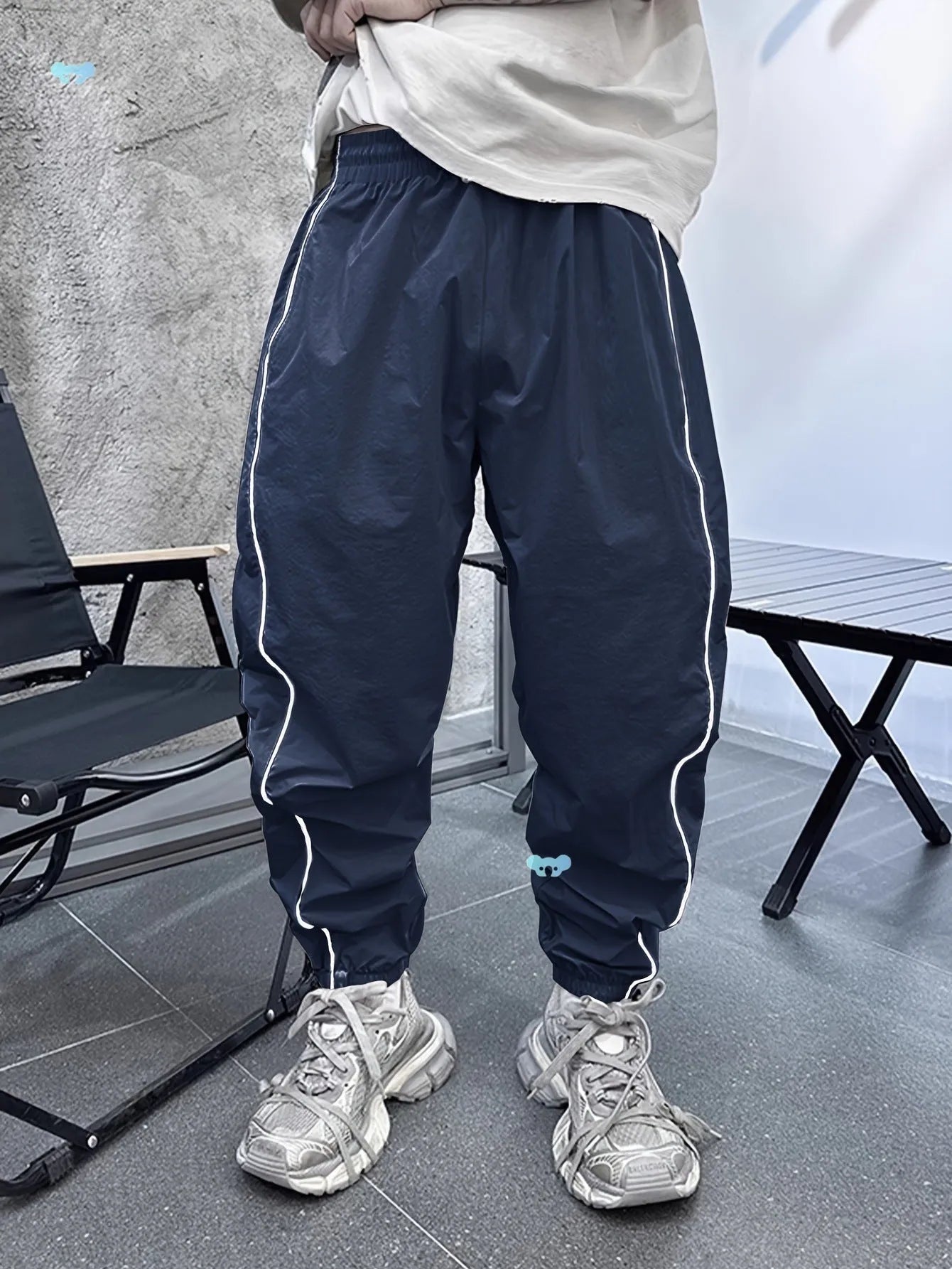 Men's loose fit casual sports trousers in bamboo fibre, shown in cropped length and multiple colours.