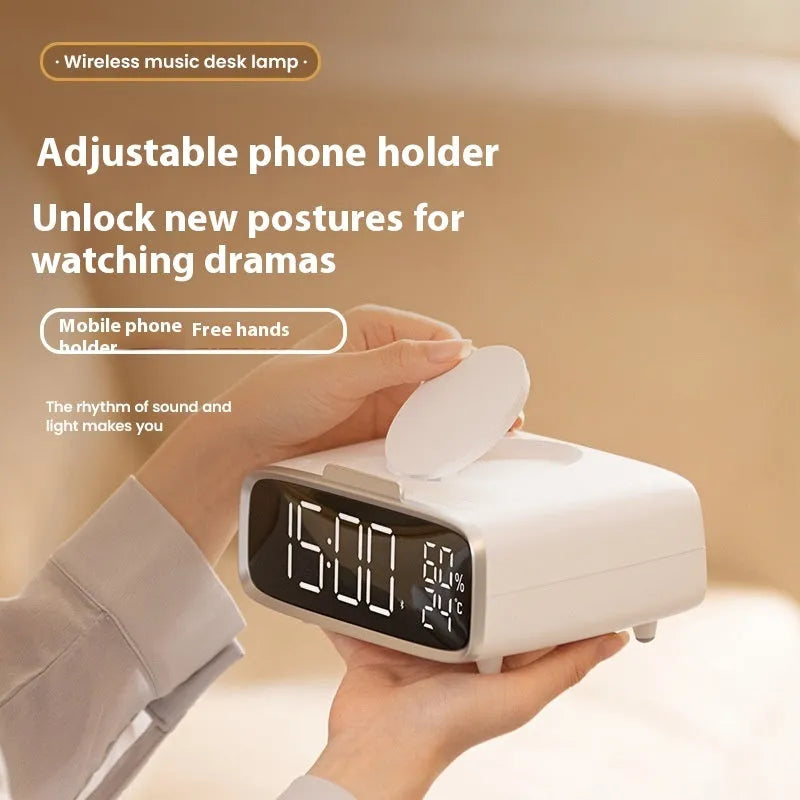 White wireless charging pad with Bluetooth speaker and night light functions