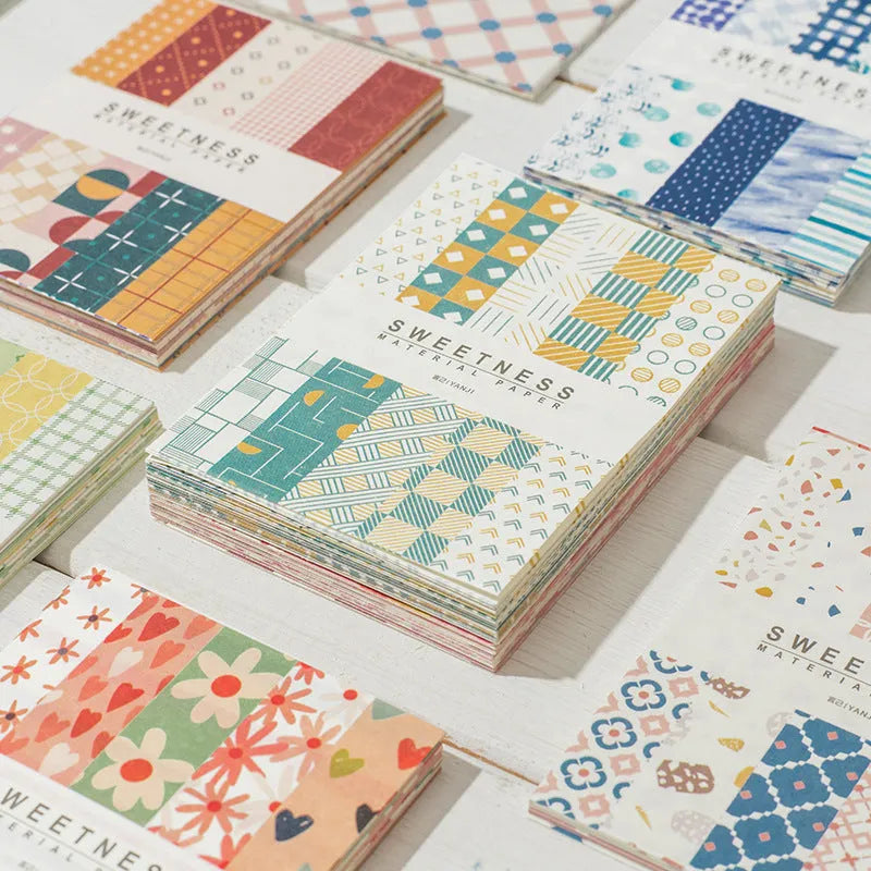 Assorted retro dessert-themed note papers in colours like caramel puff and strawberry coconut, 50 sheets per pack.