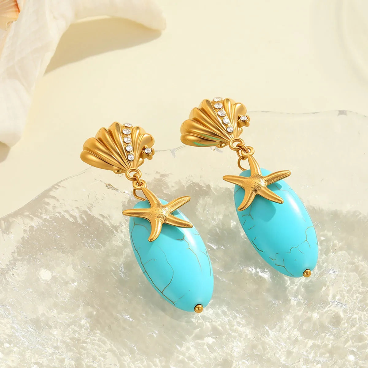 Natural turquoise stone earrings in stainless steel with 18K electroplated gold-tone geometric star shape