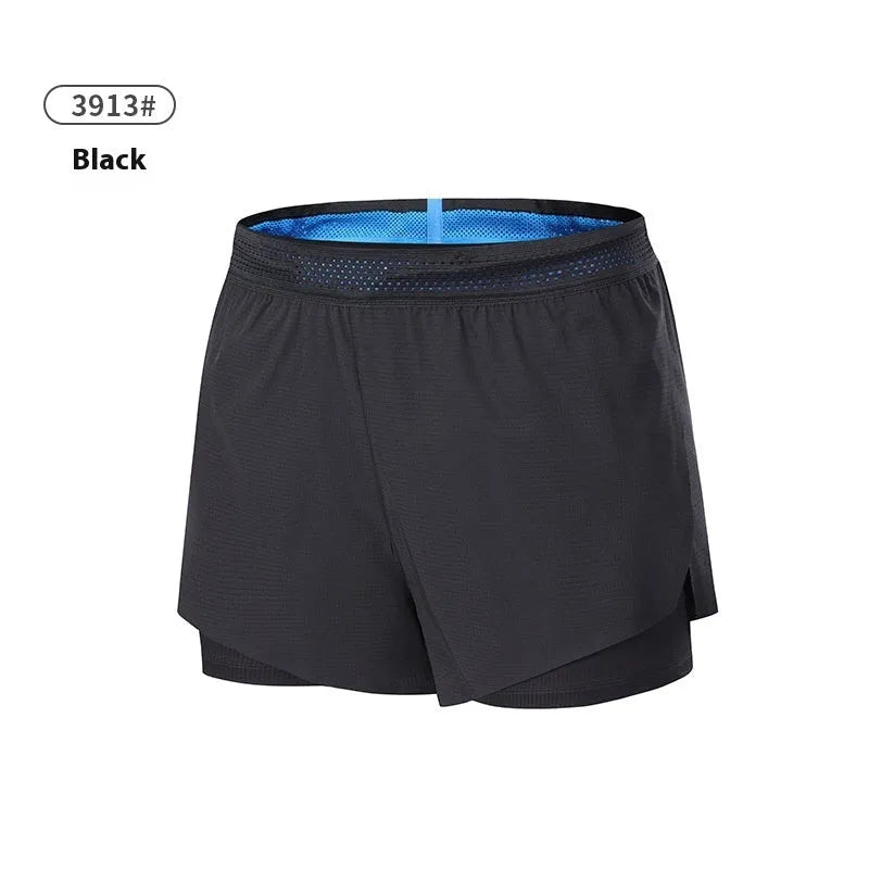 Men's solid colour low-waist polyester basketball shorts laid flat, showing short length and athletic design.