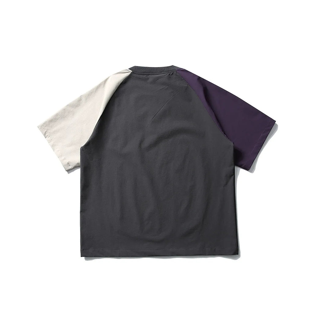 Dark grey loose fit t-shirt with raglan sleeves and contrast colour details.