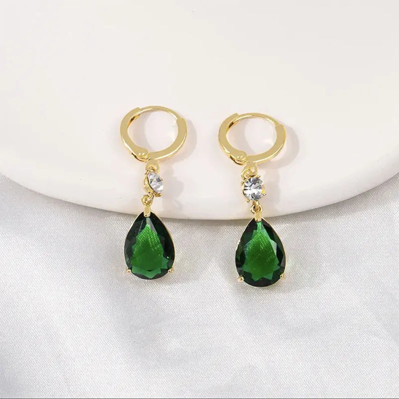 Green geometric teardrop alloy earrings with contemporary shape and lightweight construction