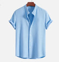 Men's loose fit short sleeve casual shirt in a solid colour on a hanger