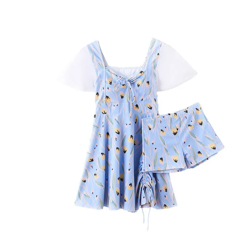 Women's floral one-piece swimsuit in Sea Salt Blue colour on a mannequin