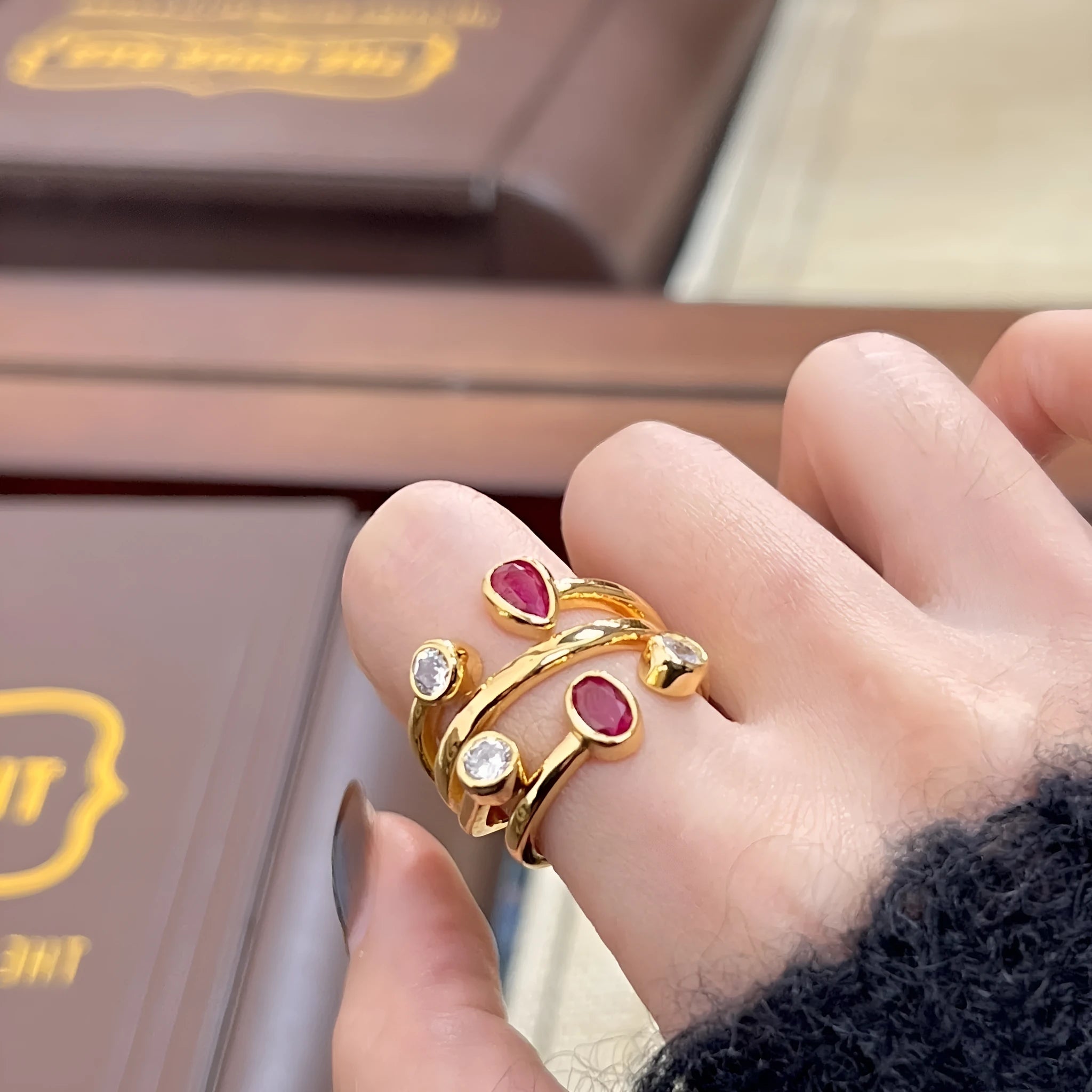 Geometric copper ring with irregular crossed design in two-tone colour finish