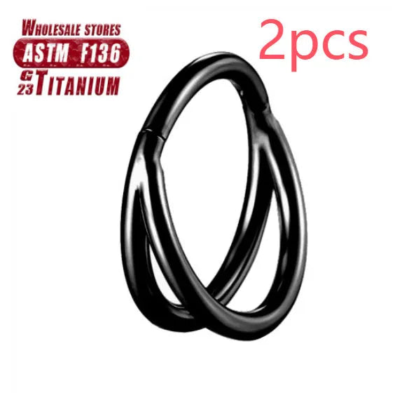 Titanium alloy fork nose ring in silver colour on a grey background