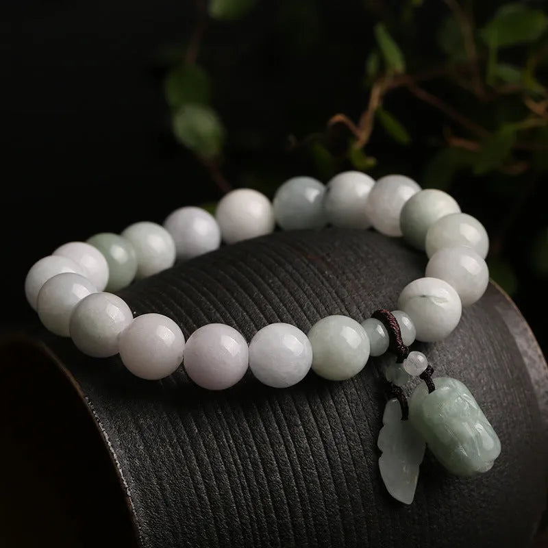 Natural jade hanging bracelet with geometric shape showing six colour and design variations.