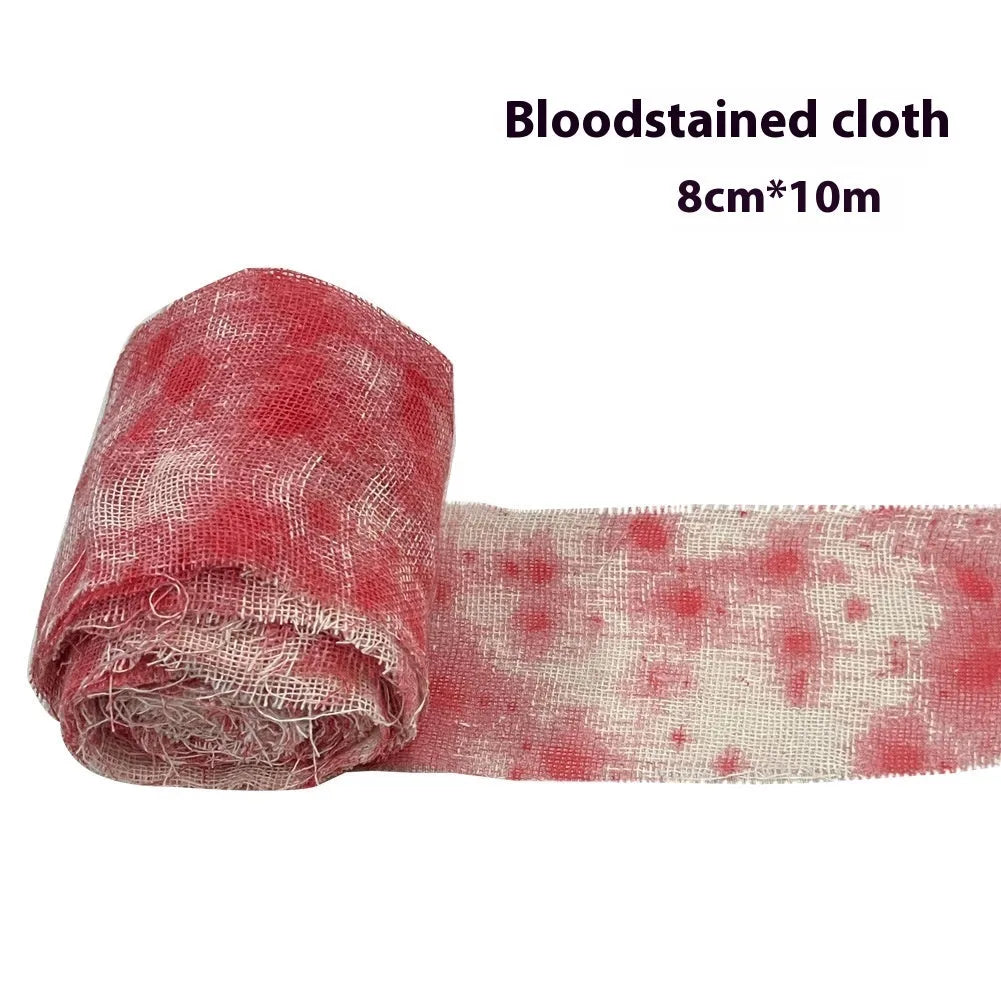 Halloween bloody dyed gauze bandage roll with 8cm width on wooden background