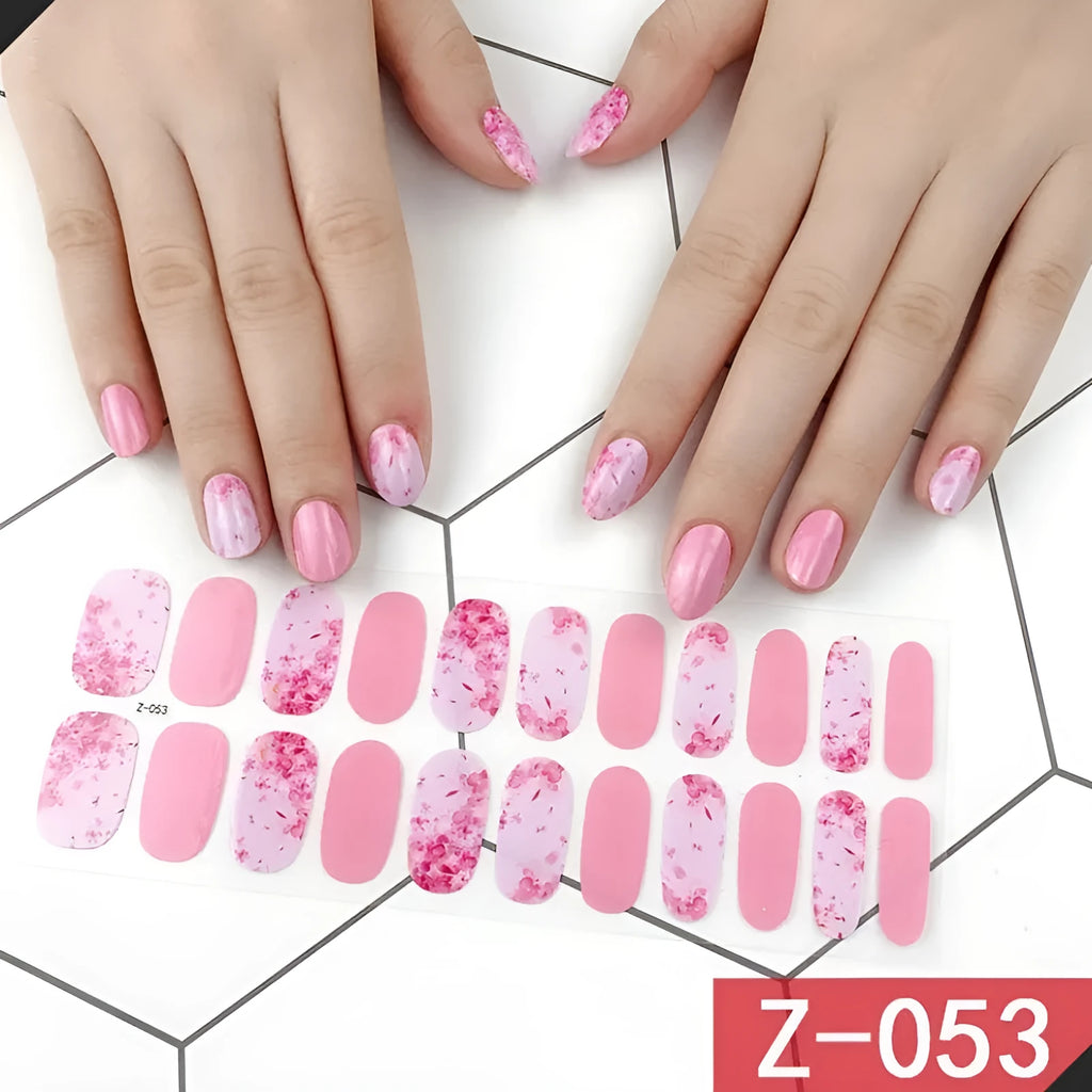 Korean nail stickers kit showing cartoon, strawberry, flower and bow patterns with included nail file