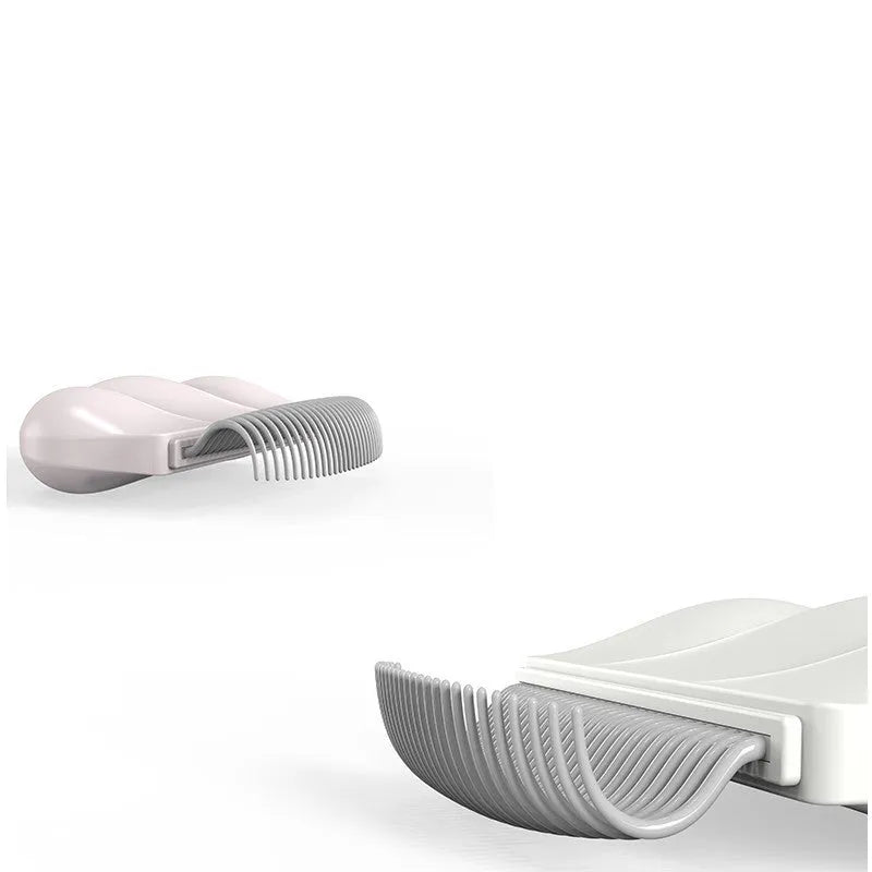 Blue Paw Soft pet deshedding brush with soft round teeth on a white background