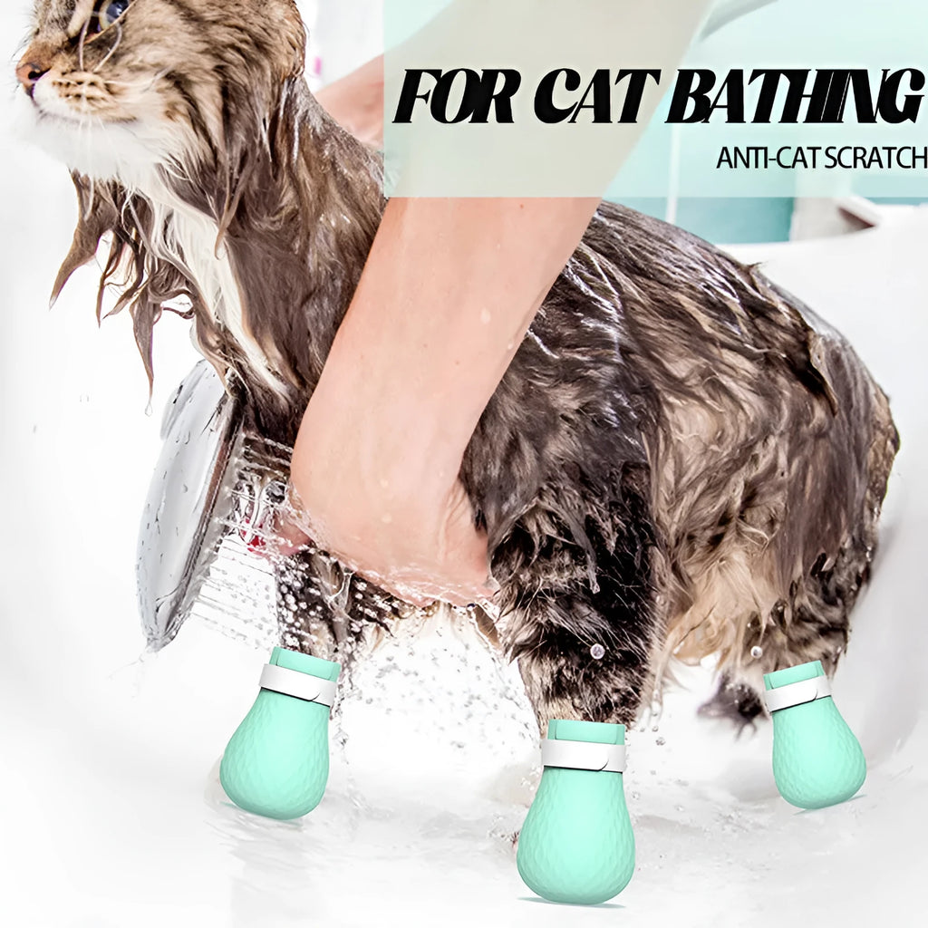 Set of four green silicone covers designed to fit over a cat's front paws.