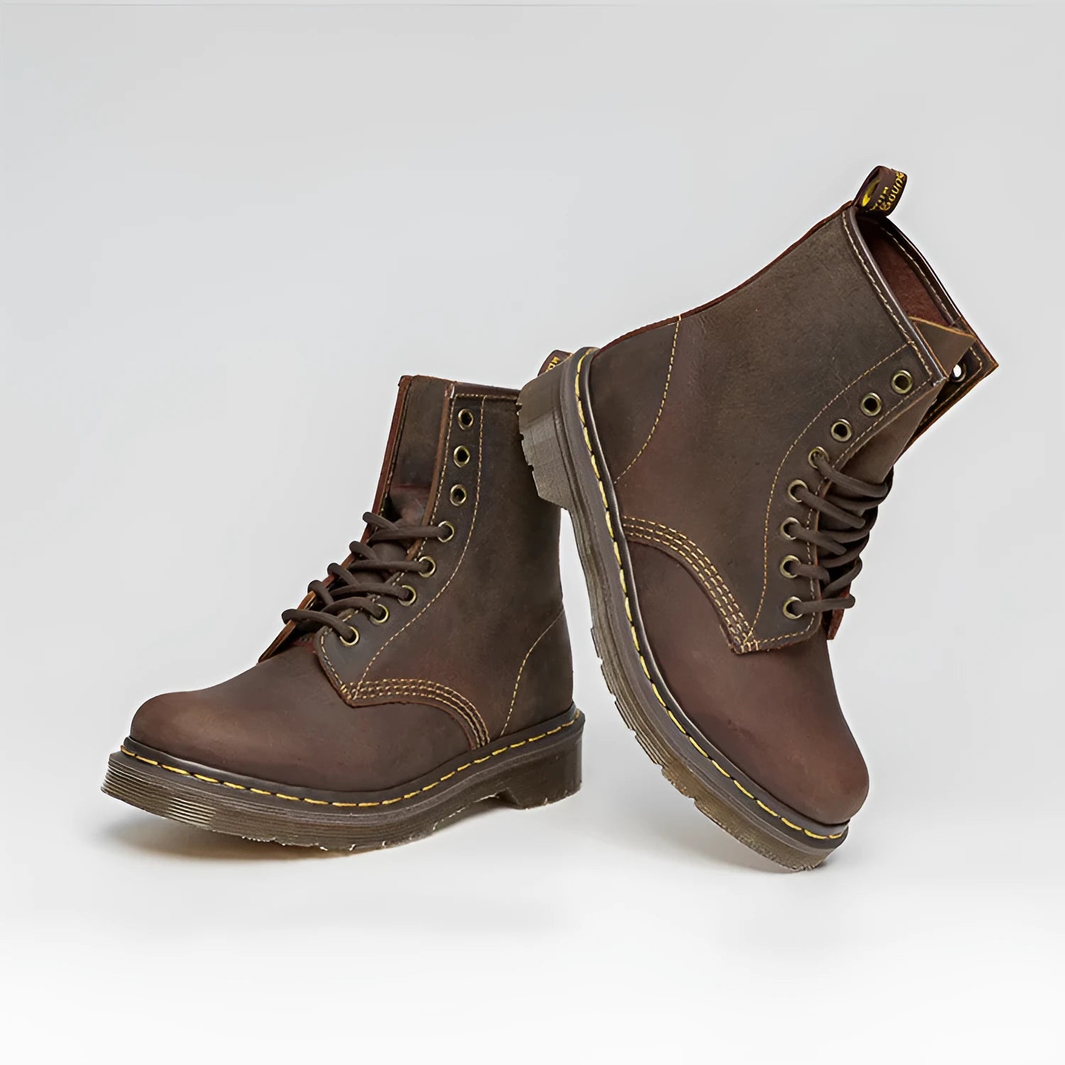 Crazy Horse leather Martin boots with round toe, wedge heel, and front lace-up closure on a white background
