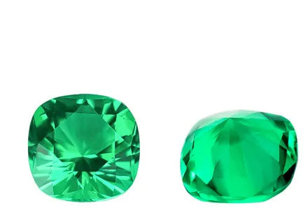 Cultivated emerald gemstones in Columbia green colour showing round, oval and emerald cut examples