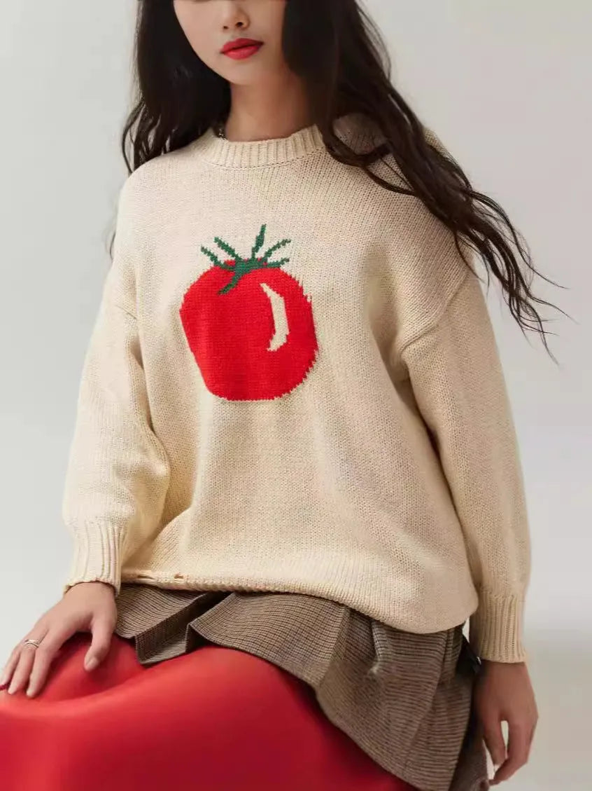 Women's milky white loose-fitting Jacquard knit sweater with round neck and long sleeves.