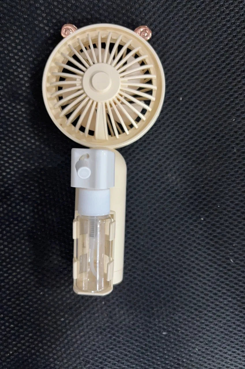 Portable plastic USB desk fan in a choice of apricot, blue, green, orange, or pink colours.