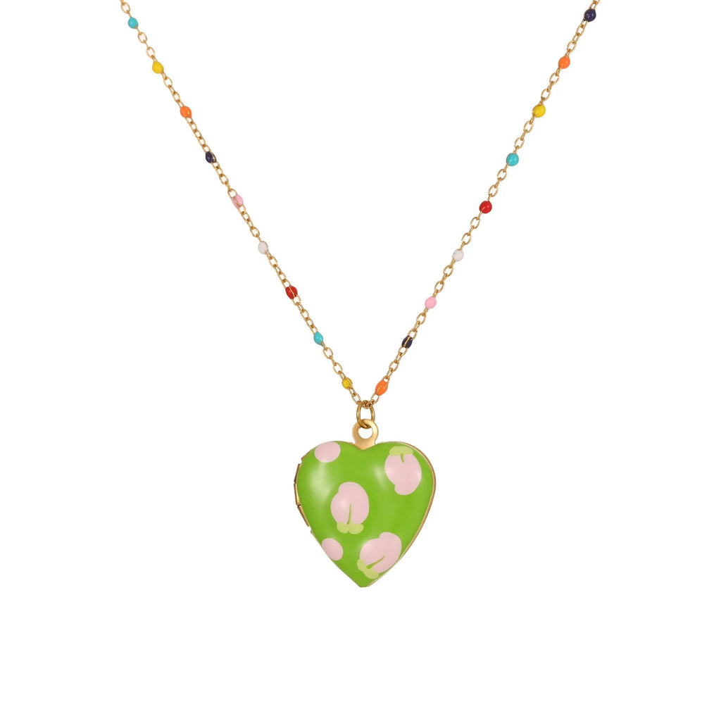 Gold-plated stainless steel necklace with a detailed strawberry-shaped pendant on a chain.