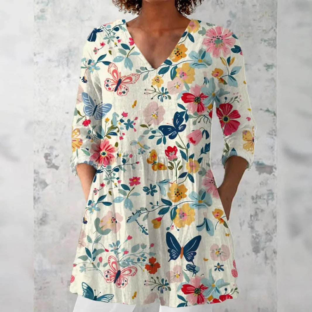 Women's retro-style printed long-sleeved top in a slim fit, shown in a colour option, suitable for smart casual wear.