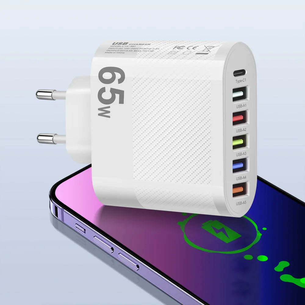White and black mobile phone charging plugs with USB port and UK/US/EU outlet options