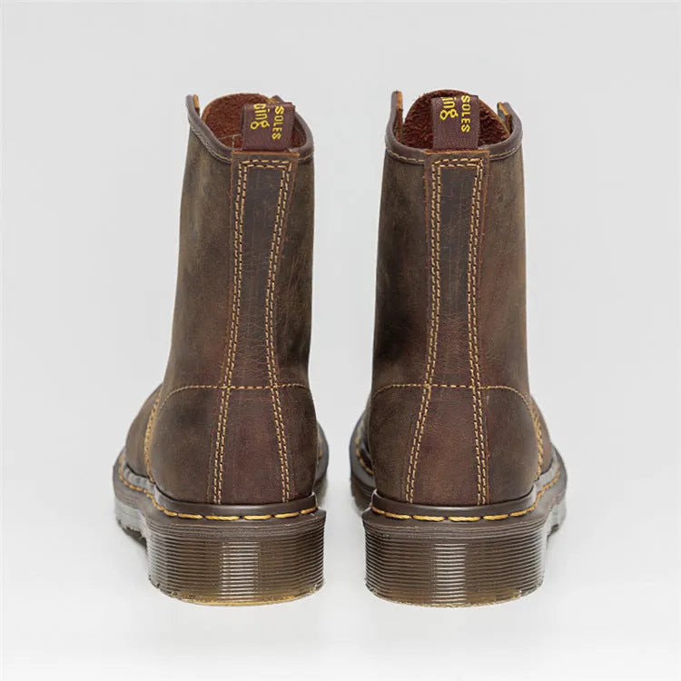Crazy Horse leather Martin boots with round toe, wedge heel, and front lace-up closure on a white background