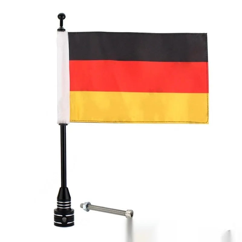 Silver electroplated tail box flagpole mounted on commercial vehicle parcel rack with German flag