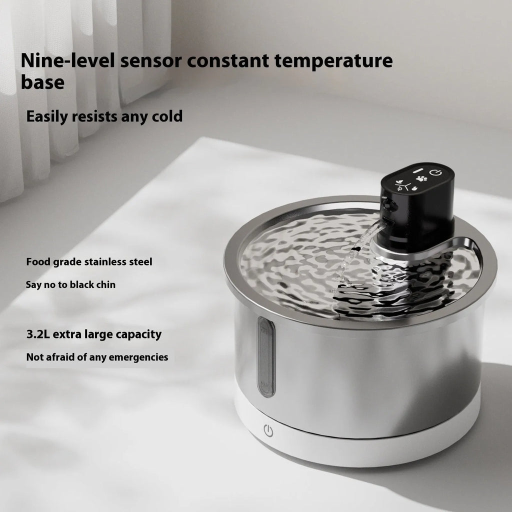 Stainless steel cat and dog water fountain with constant temperature heating base.
