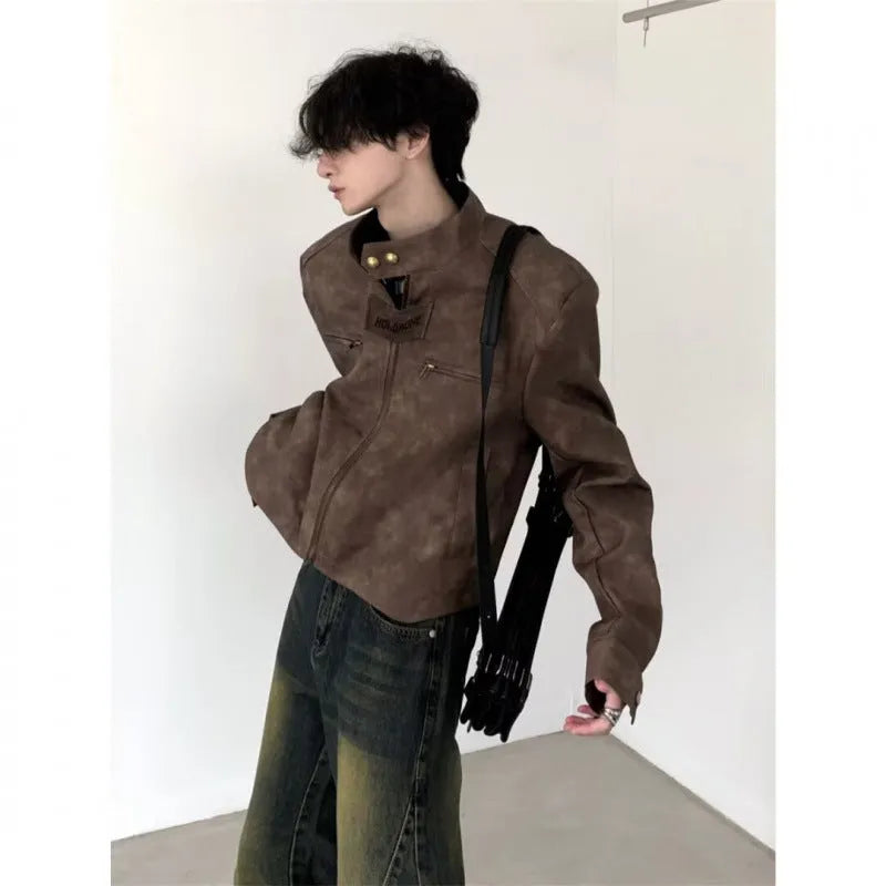 Men's retro brown PU leather short coat with long sleeves and tight fit, shown in casual style.