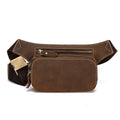 Brown top-grain cowhide men's sports waist bag with pull-cord closure, shown with a 10-inch laptop.