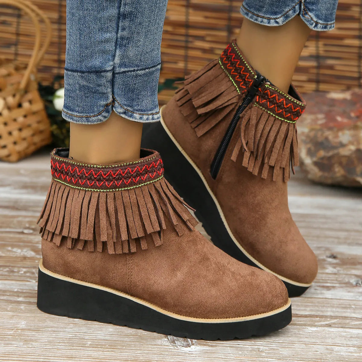 Women's black suede wedge bootie with thick platform sole and side zip.