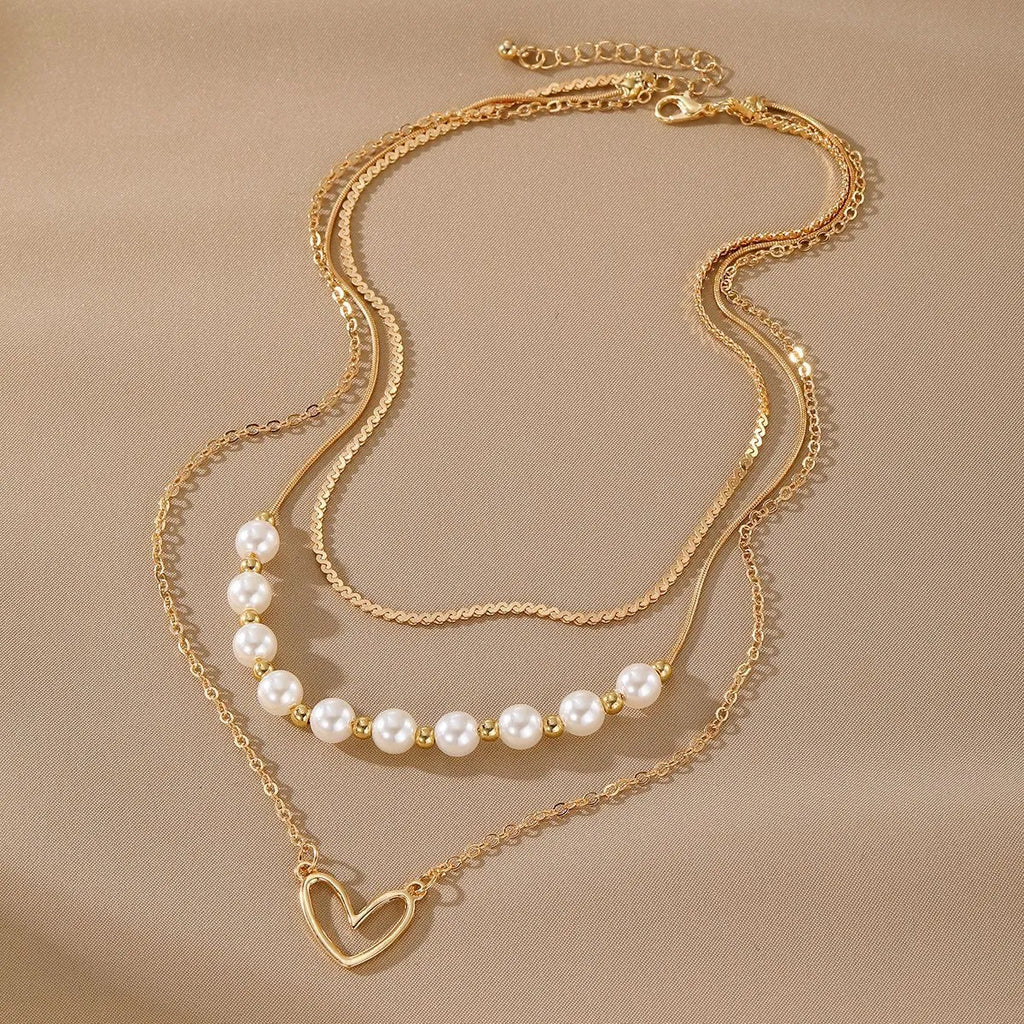 Vintage gold heart pendant necklace on pearl chain with adjustable 41-50cm length