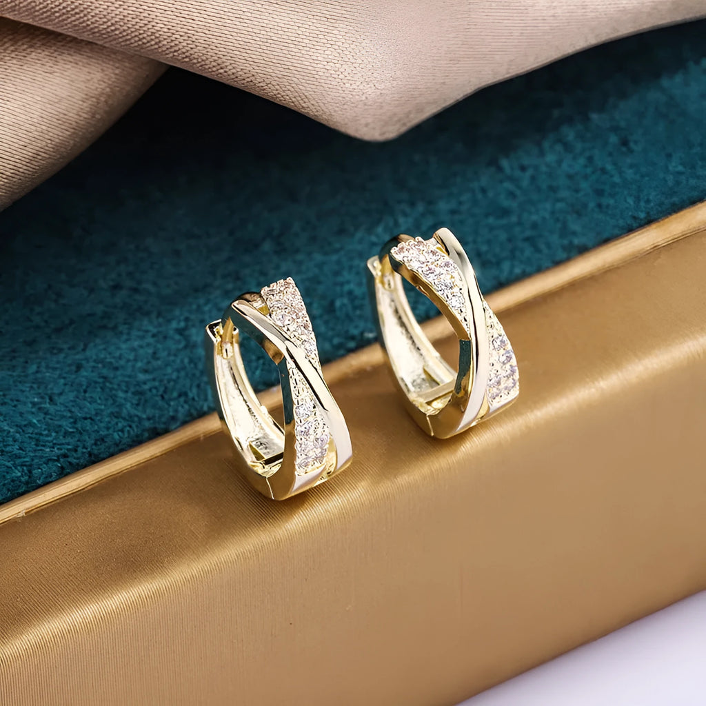 Geometric drop earrings with zircon stones and 14K yellow gold plating on copper