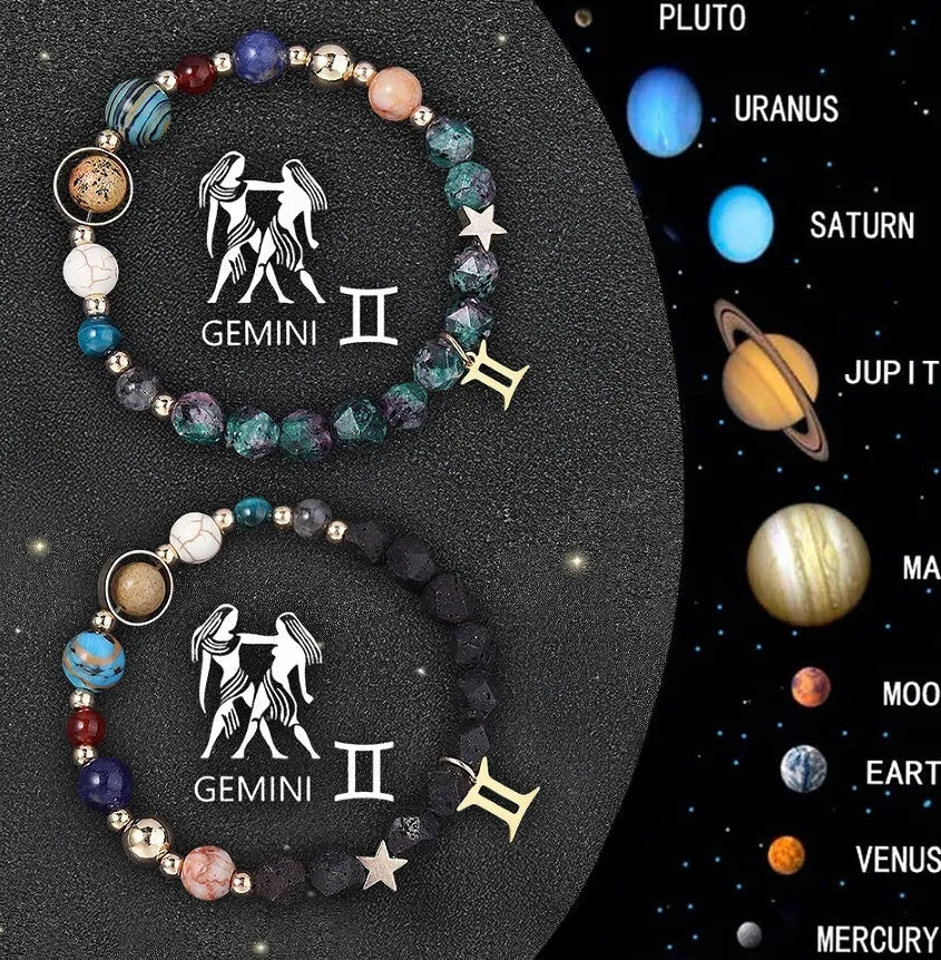 Two adjustable beaded bracelets with natural stone beads and sterling silver zodiac charms on a wrist.
