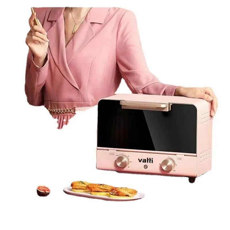 Pink home kitchen electric oven with up and down heating, 4-5 person capacity, 260x205x171mm, on countertop