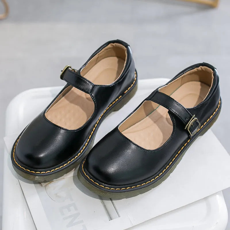 Women's solid colour round toe low-cut flat retro shoes with buckle closure in black