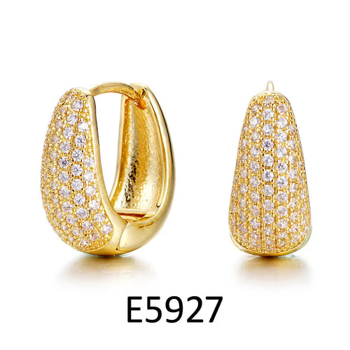 Gold plated heart-shaped ear clip earrings with zircon decoration and gang drill elements