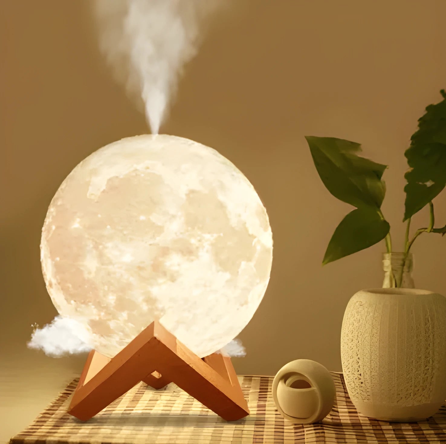 Wood finish Lunar humidifier night light with spherical design on a table.