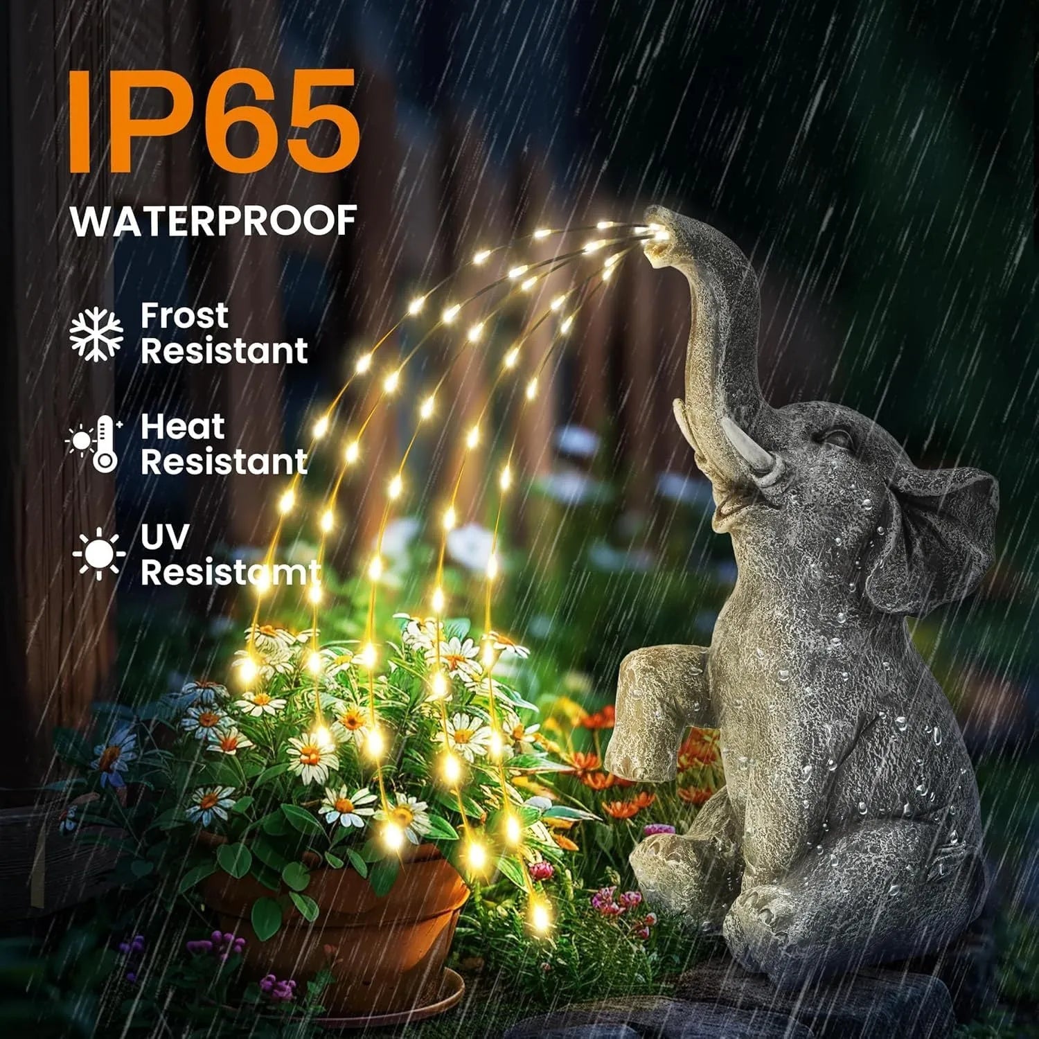 A textured resin elephant garden statue with a built-in LED light strip illuminating its back, placed amongst plants.