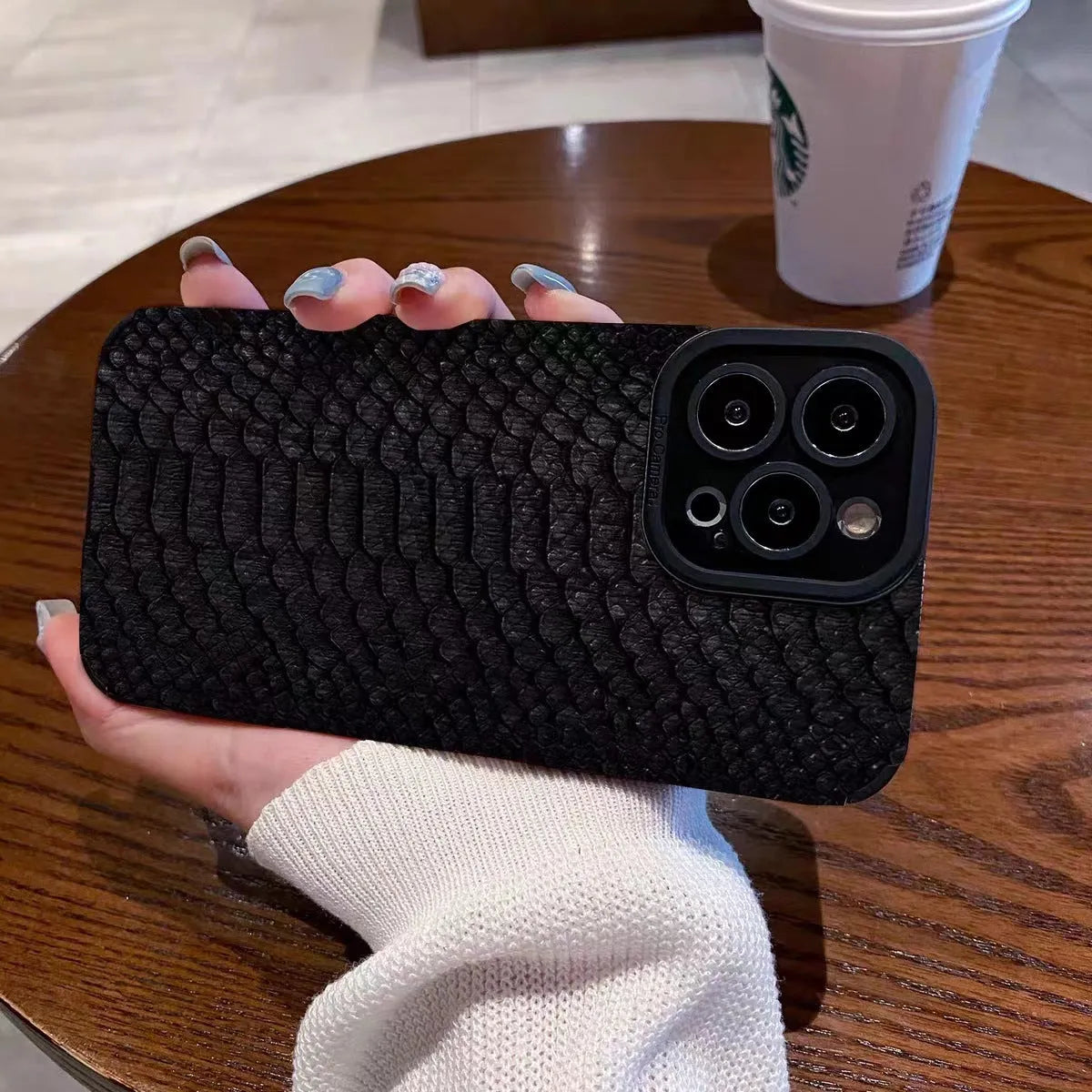 Black TPU phone case for iPhone 13 Pro Max with three-dimensional scales pattern and anti-fingerprint finish