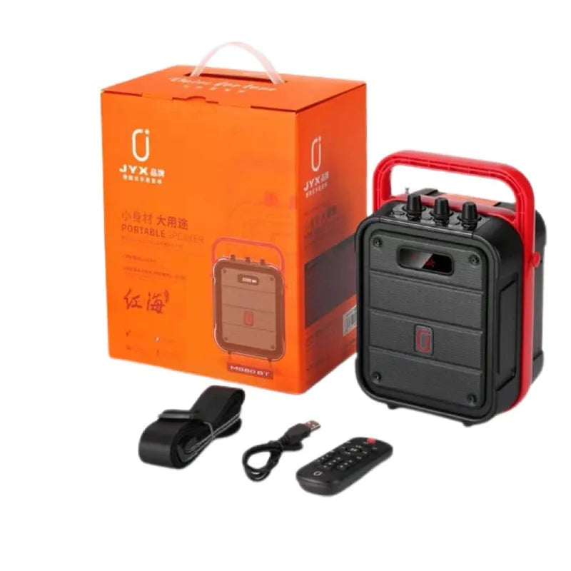 MS62AI portable Bluetooth speaker with wireless microphone on a table.