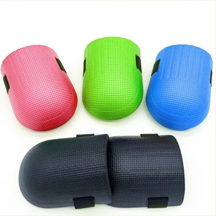 A pair of EVA foam knee pads in various colours, suitable for construction and DIY kneeling tasks.