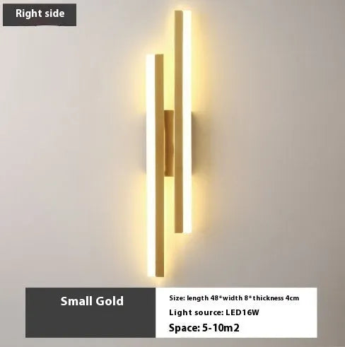 Minimalist Scandinavian-style LED wall light with acrylic shade in black or gold finish