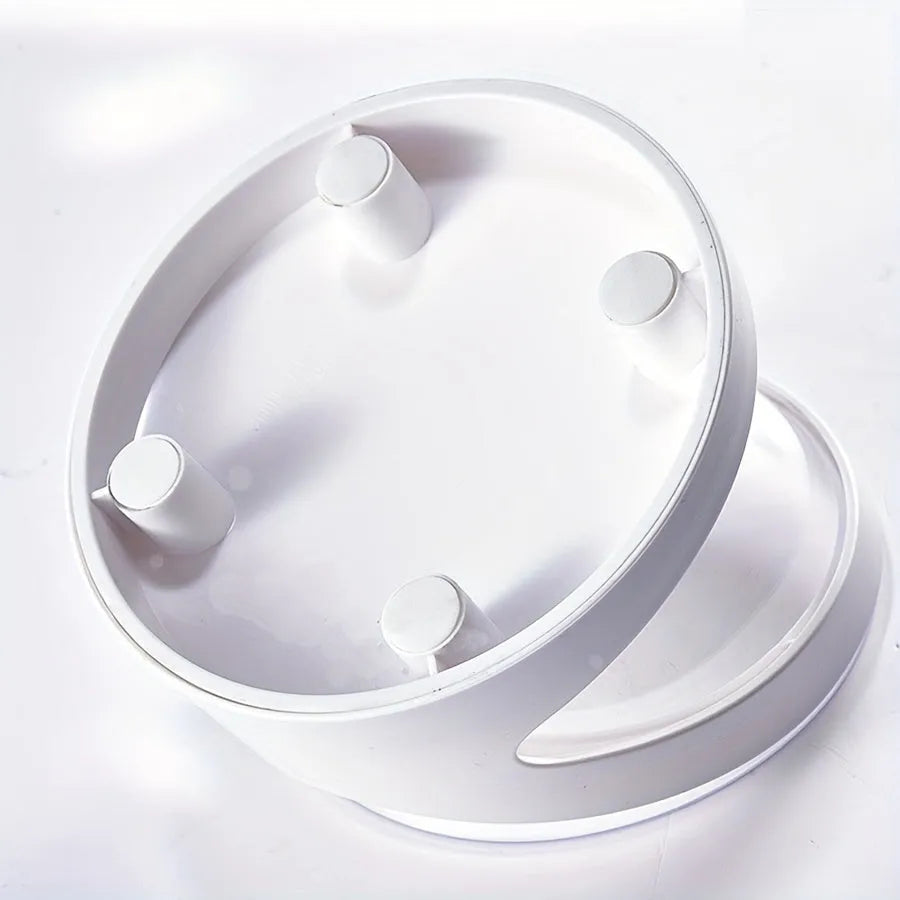 White clear plastic elevated cat food bowl with tilted ergonomic design for neck protection.