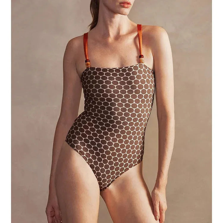 Women's dot pattern one-piece swimsuit with matching wrap skirt set