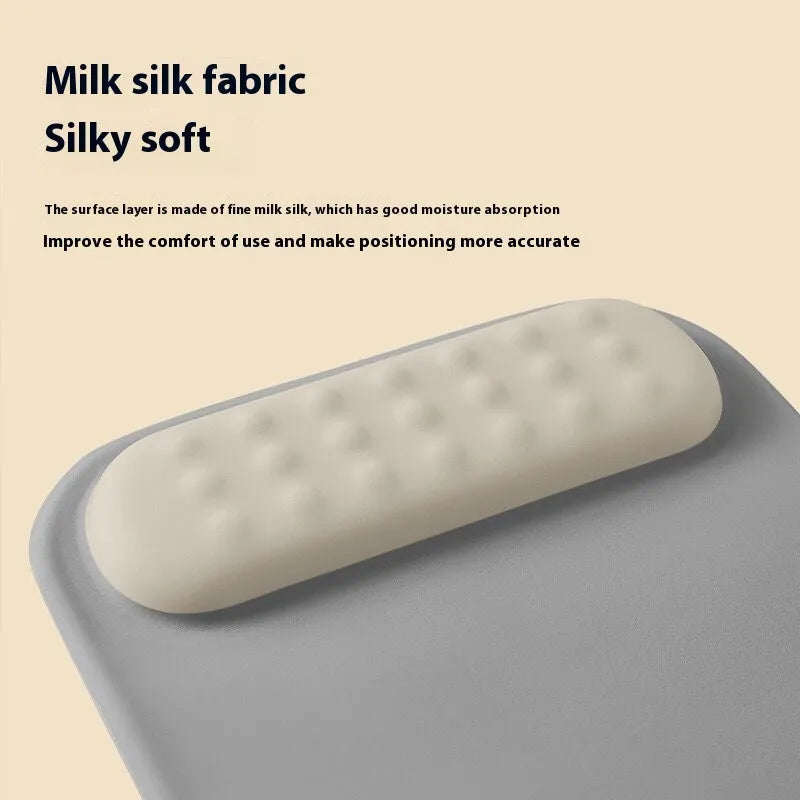 Ergonomic mouse pad with wrist rest in cloth silicone construction showing colour pattern options