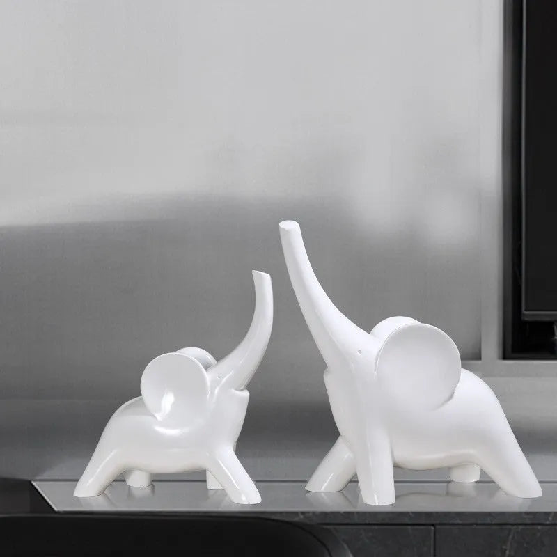 Modern minimalist resin elephant ornament in rose gold or white colour, available in large and small sizes.
