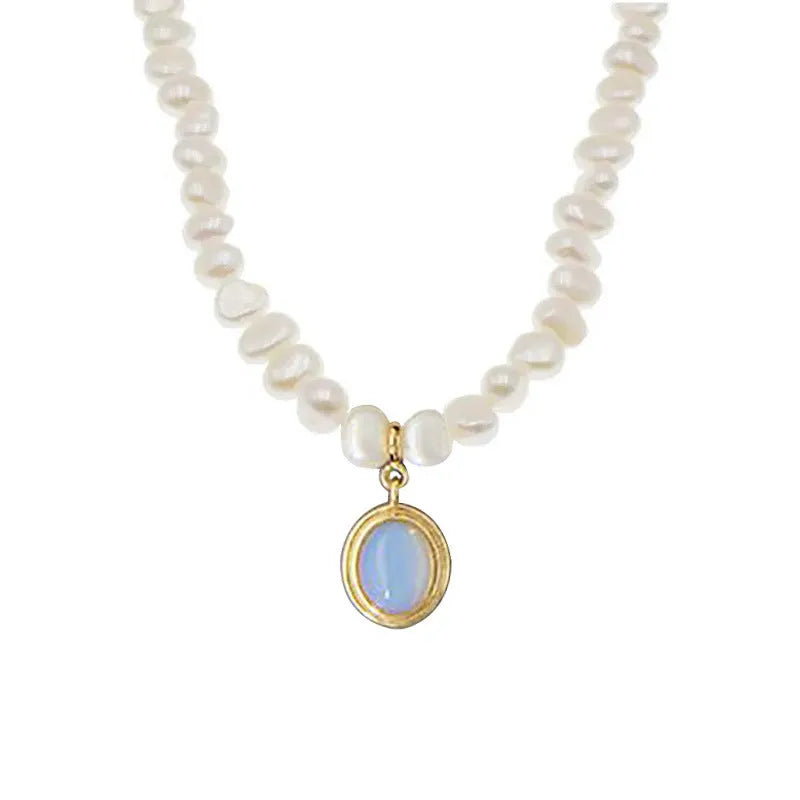Silver necklace with round medal and irregular pearl geometric pendant on adjustable chain