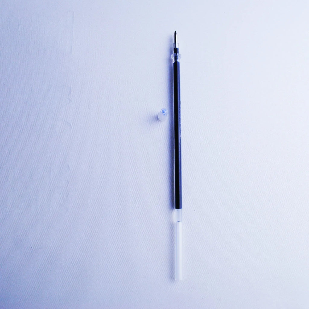 Portable fading ink pen set with 0.5mm tip, blue refills, and plastic body.