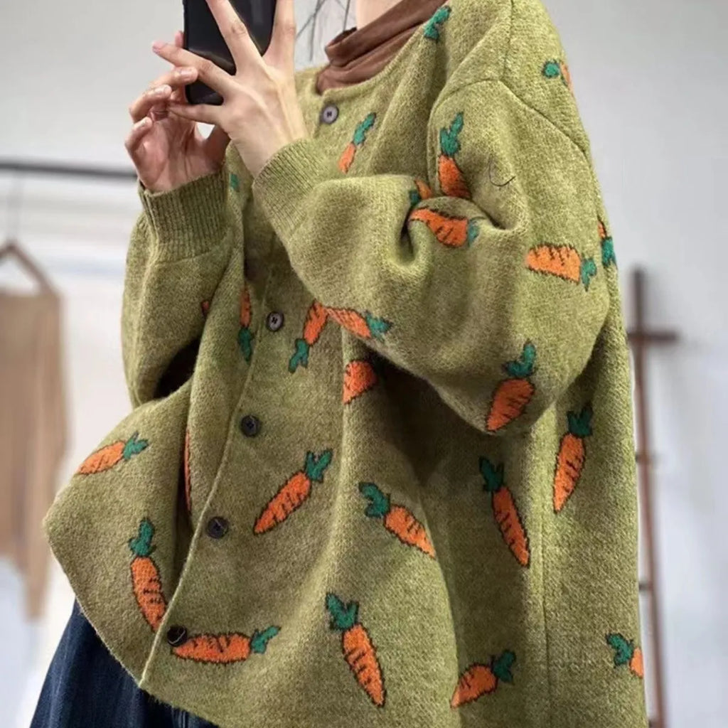 A loose-fitting cardigan with a round neck, artistic printing, and colour contrast details.