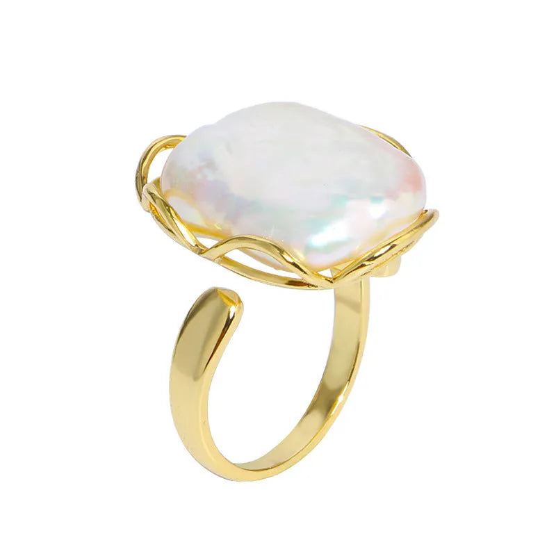 Women's adjustable baroque pearl ring with geometric shape, shown in purple and gold colour options