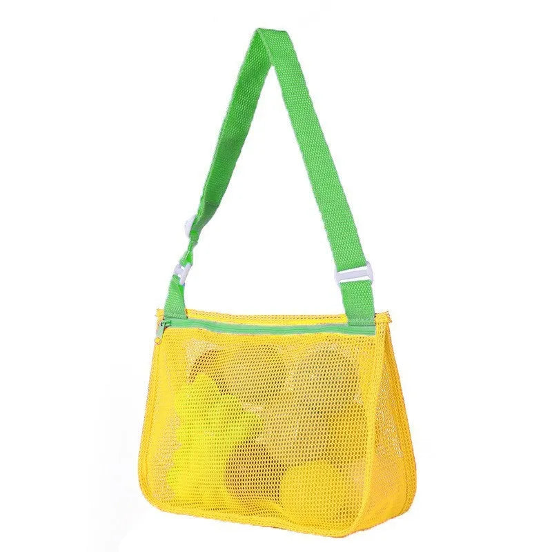 Blue nylon mesh travel storage bag with black handle and zip seal for children's clothing organisation